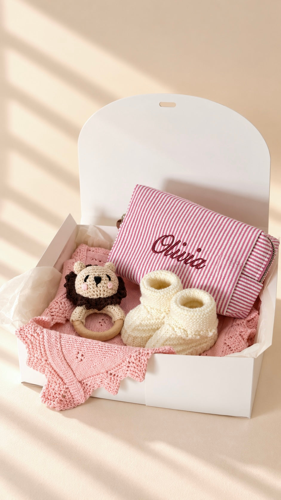 The Jolié striped toiletry bag